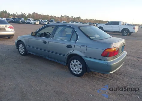 1999 Honda Civic Lx z USA, uszkodzony, nr VIN 2HGEJ6678XH582950